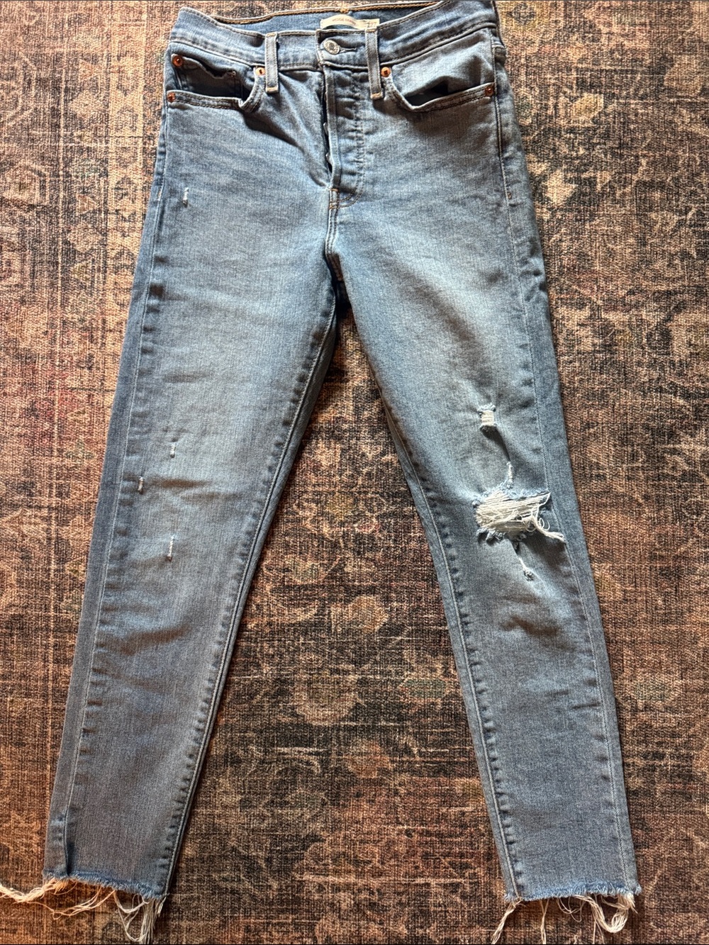 Levi's Light Blue Skinny Jeans with Distressed Knee
